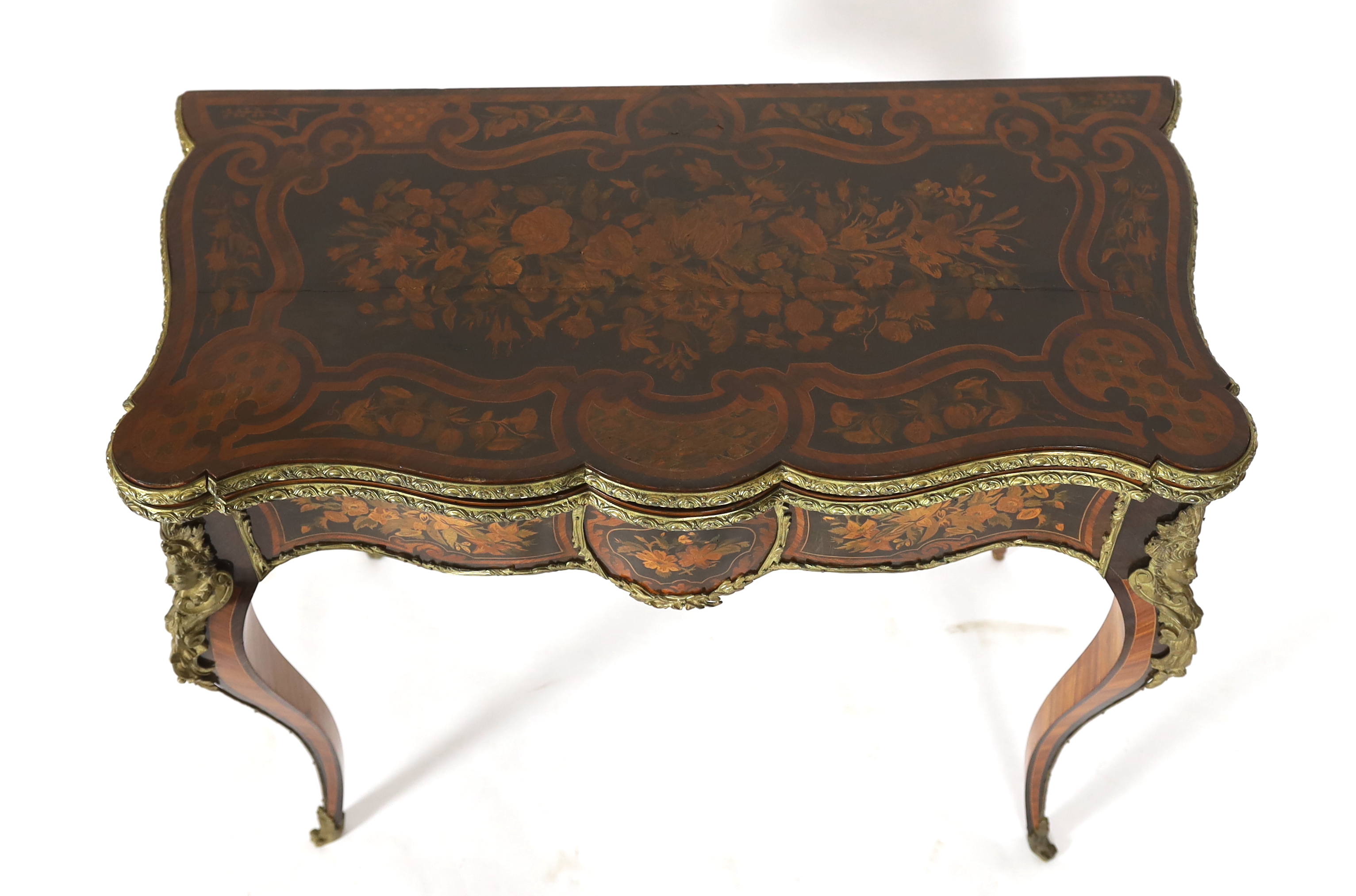 A late 19th century French ormolu mounted marquetry card table 89cm wide, 44cm deep, 78cm high